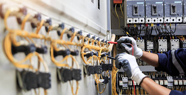 Professional Electrical Panel Upgrade technician working in Henderson County County, IL